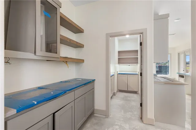 a kitchen with a cabinets and a stove