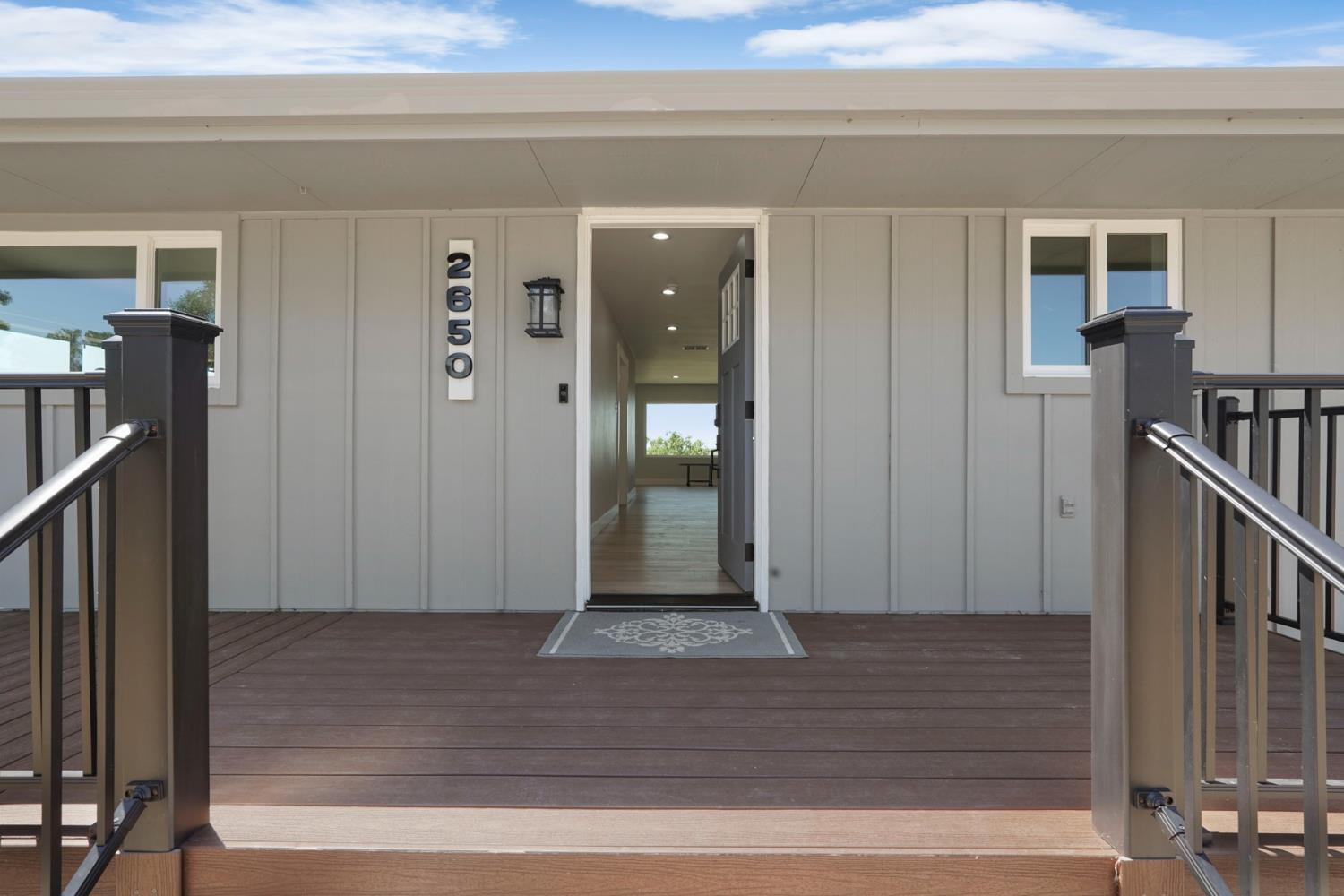 2650 West Twitchell Island Road Rio Vista, CA 94571 - Photo 5 of 60 a view of a hallway with wooden floor and staircase