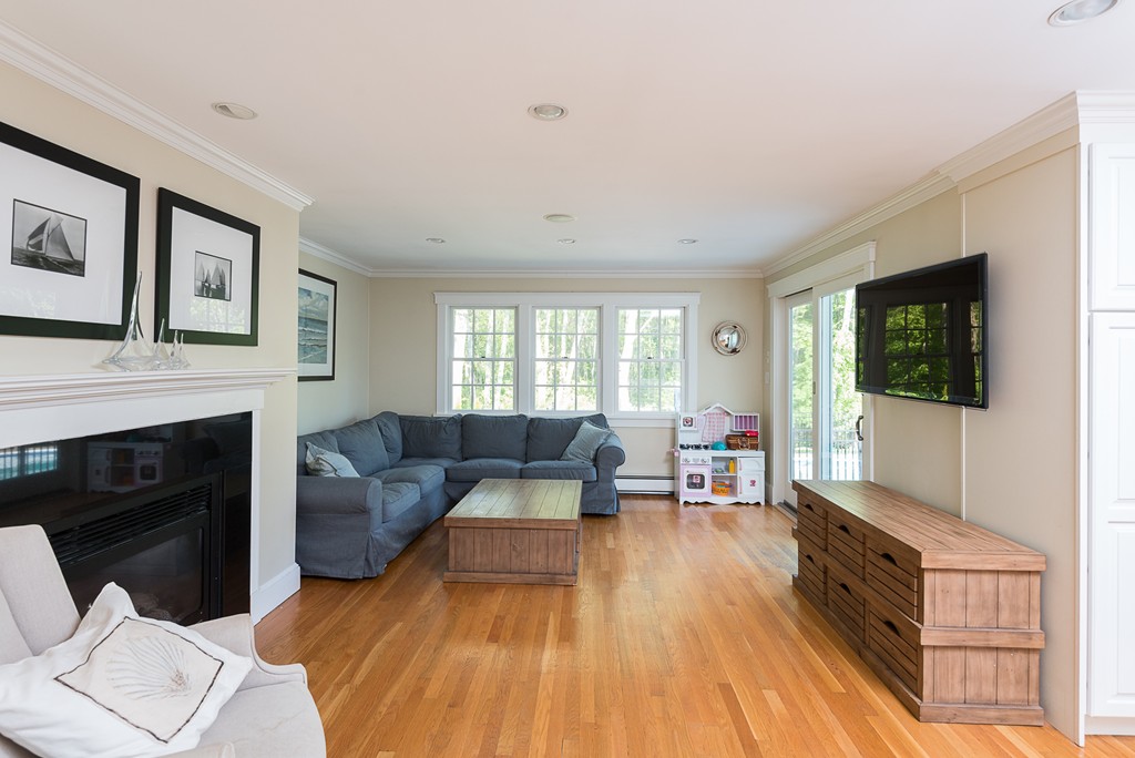 35 Stanford Drive Westwood, MA 02090 - Photo 14 of 29 a living room with furniture and a fireplace