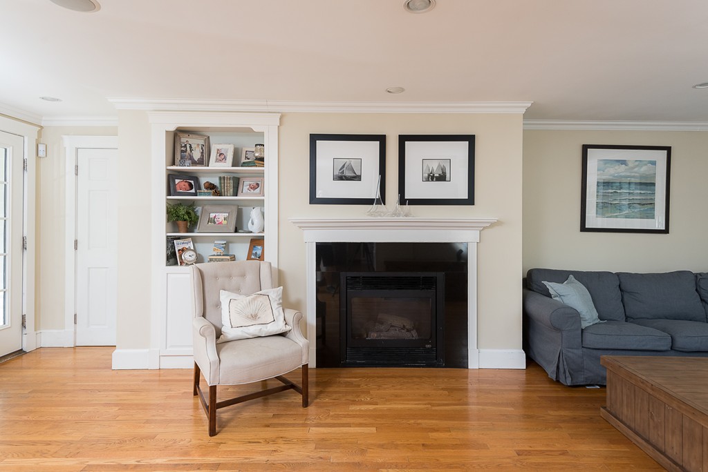 35 Stanford Drive Westwood, MA 02090 - Photo 15 of 29 a living room with furniture and a fireplace