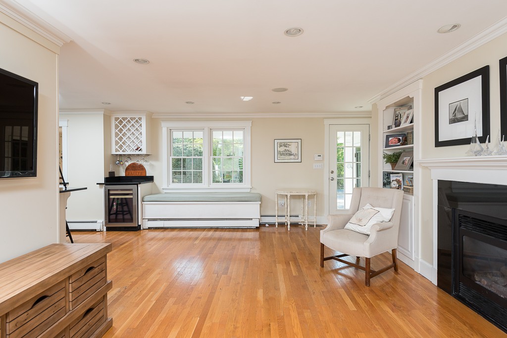 35 Stanford Drive Westwood, MA 02090 - Photo 16 of 29 a living room with furniture and a fireplace