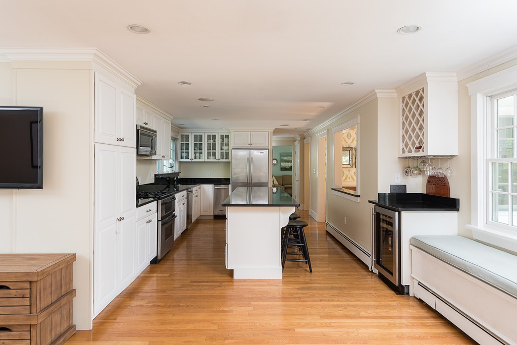 35 Stanford Drive Westwood, MA 02090 - Photo 17 of 29 a kitchen with refrigerator and cabinets