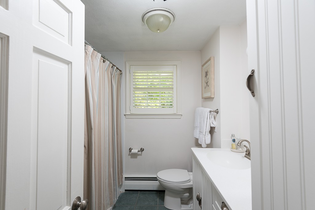 35 Stanford Drive Westwood, MA 02090 - Photo 19 of 29 a bathroom with a sink toilet and shower