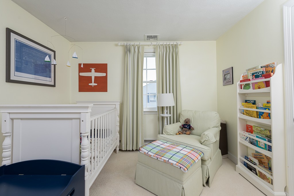 35 Stanford Drive Westwood, MA 02090 - Photo 20 of 29 a bedroom with a bed and a window