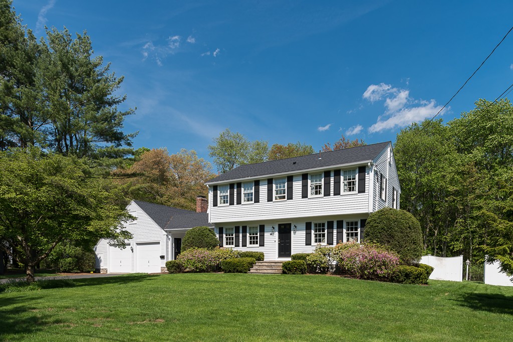 35 Stanford Drive Westwood, MA 02090 - Photo 2 of 29 a front view of a house with a garden