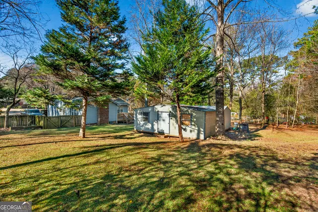 a house with trees in front of it