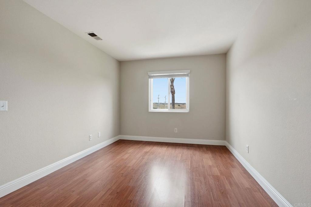 342 Rimhurst Court Oceanside, CA 92058 - Photo 34 of 53 Upstairs bedroom with walk-in closet and hillside views