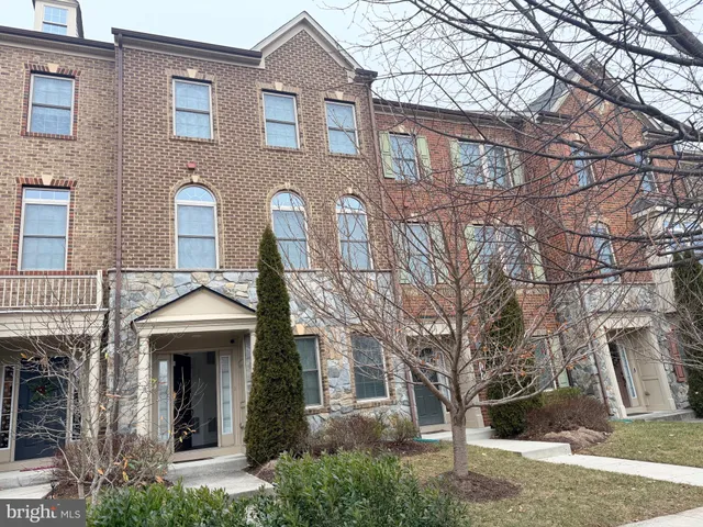 a front view of a house with yard