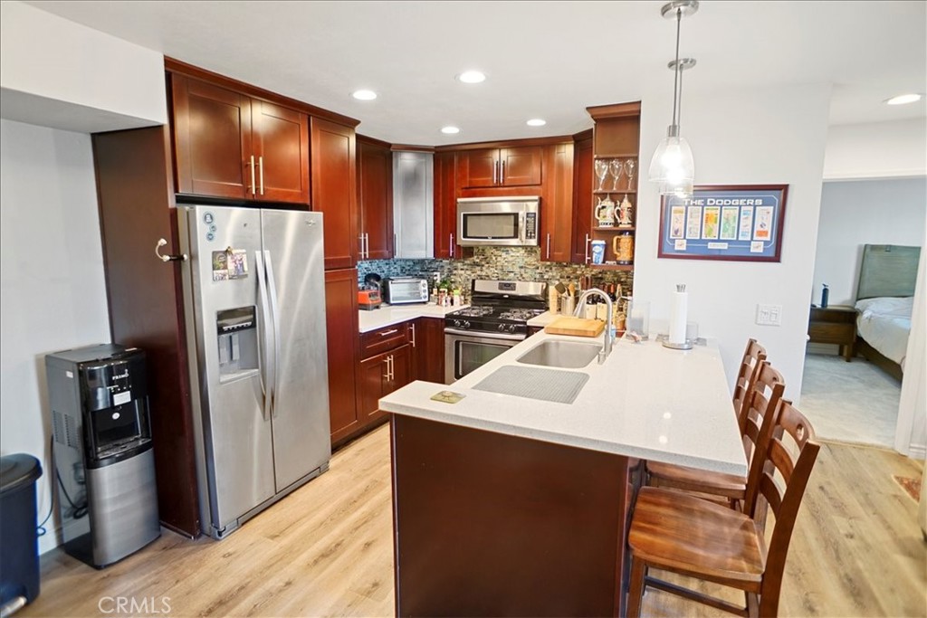 24439 Leonard Tree Lane, Unit 102 Newhall, CA 91321 - Photo 3 of 16