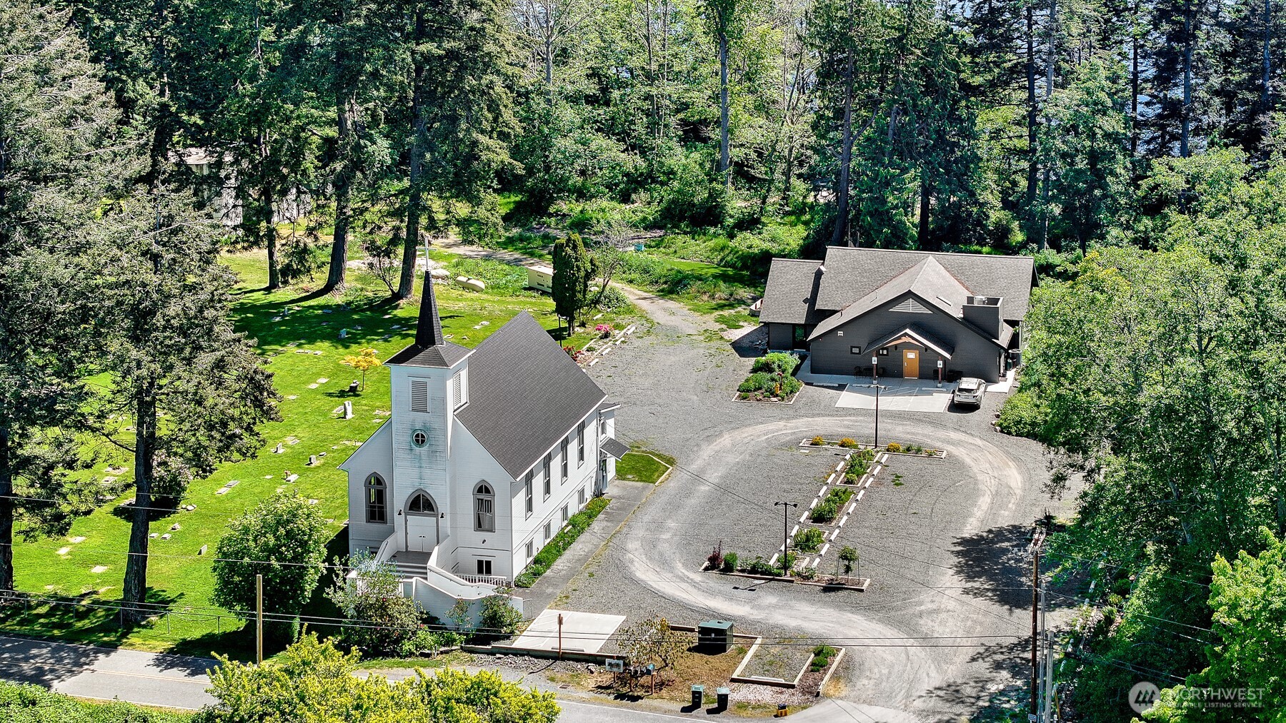 2093 Granger Way Lummi Island, WA 98262 - Photo 18 of 35 an aerial view of a house with a yard and trees