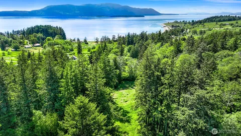 a view of a lake with a mountain in the background