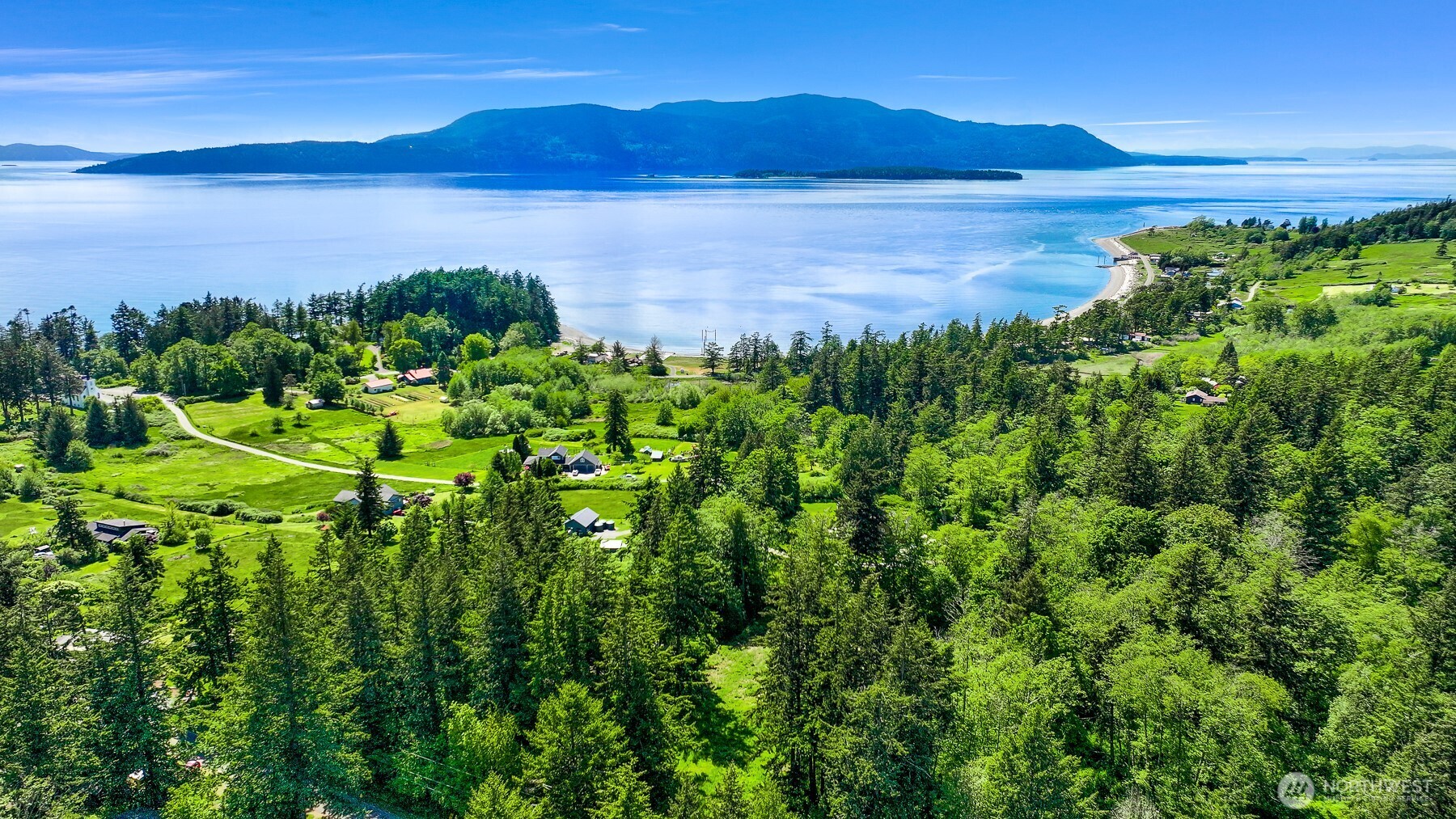 2093 Granger Way Lummi Island, WA 98262 - Photo 10 of 35 a view of a lake with a mountain in the background