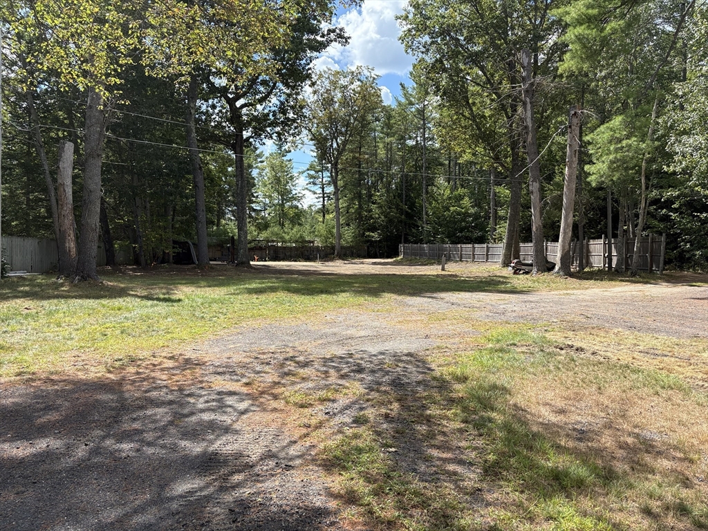 6 Wyman Road Ashburnham, MA 01430 - Photo 21 of 39 a swimming pool with trees in the background