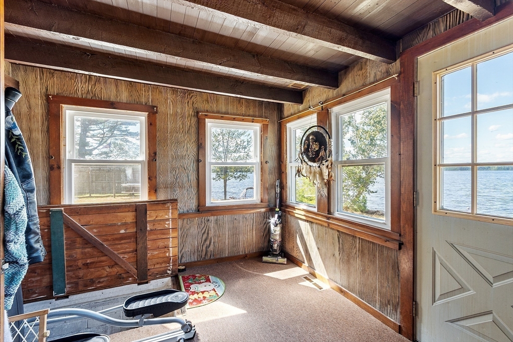 6 Wyman Road Ashburnham, MA 01430 - Photo 31 of 39 a view of a livingroom with furniture wooden floor and windows