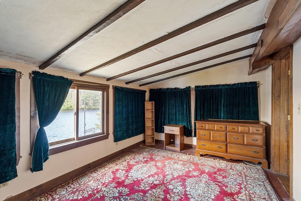 6 Wyman Road Ashburnham, MA 01430 - Photo 36 of 39 a living room with furniture rug and window