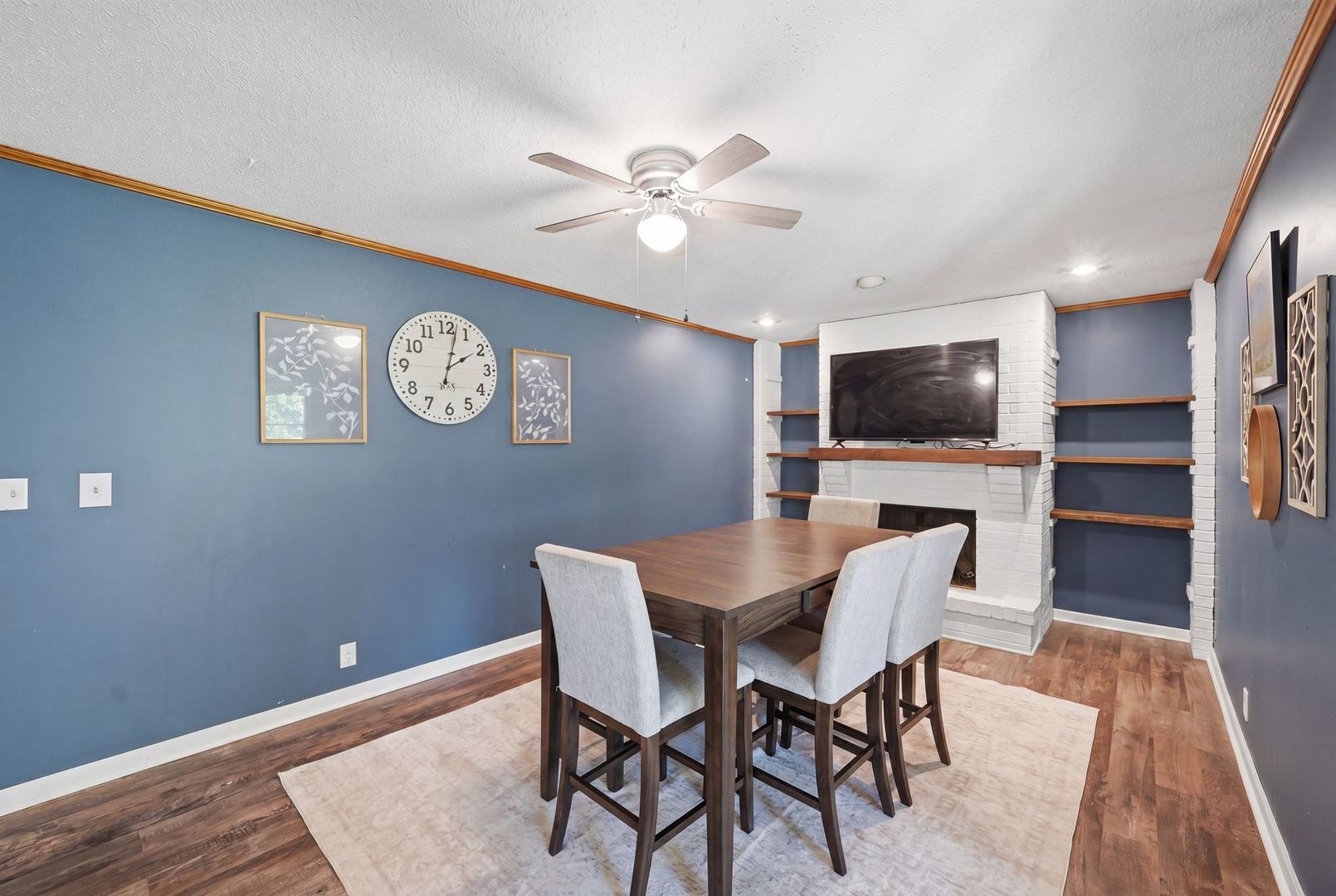 5645 Beebe Drive Rochelle, IL 61068 - Photo 16 of 43 a view of a livingroom with furniture and a flat screen tv