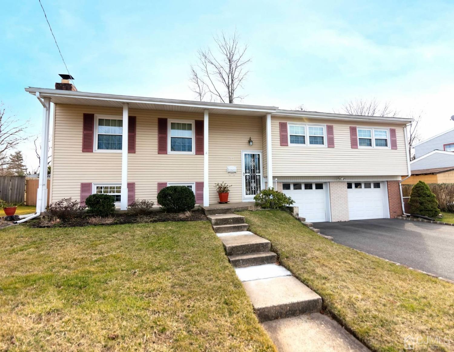 77 Harmon Road Edison, NJ 08837 - Photo 2 of 23 a view of a house with pool