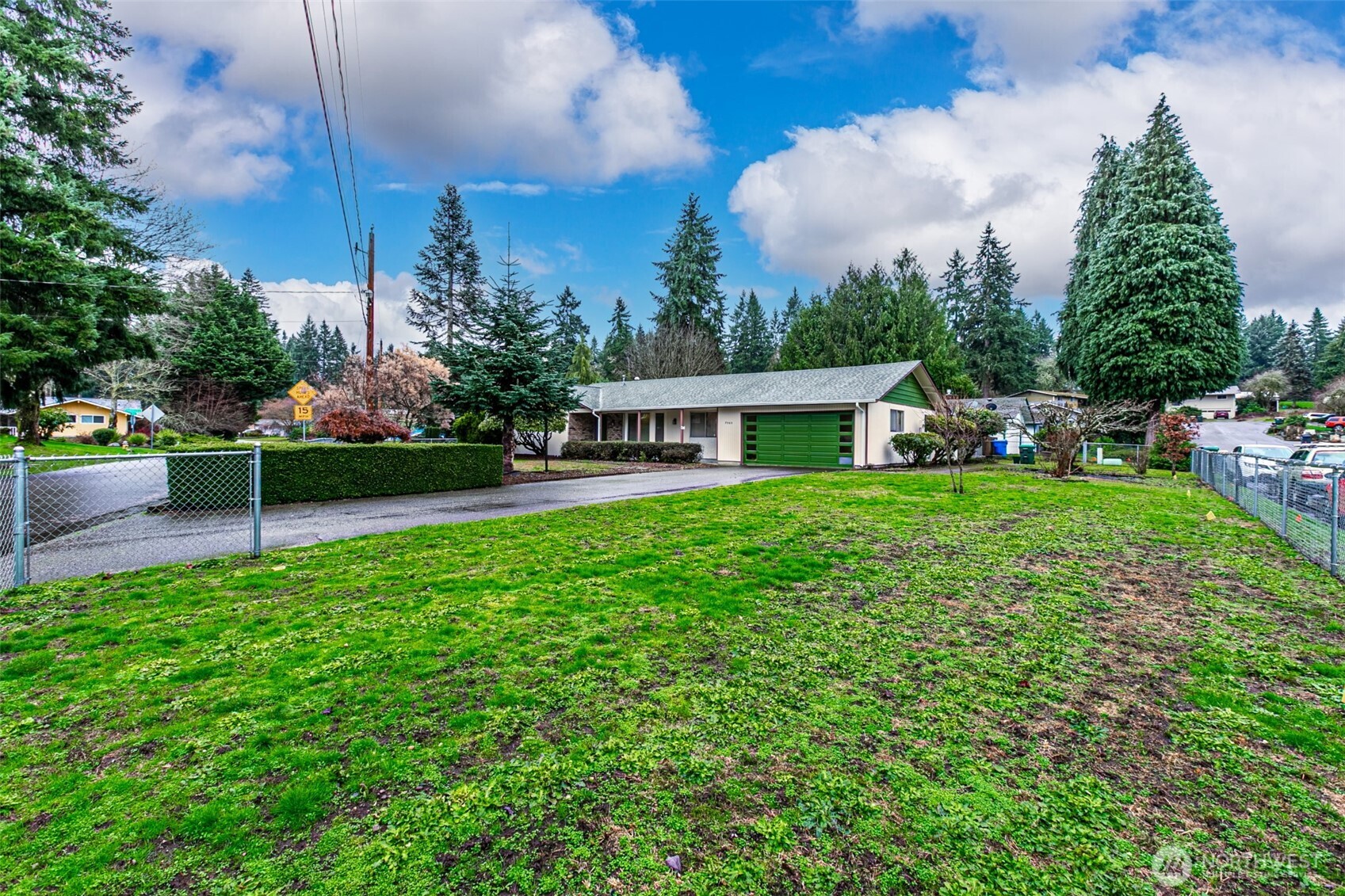 7505 Husky Way Southeast Lacey, WA 98503 - Photo 2 of 40 a view of a house with a yard and sitting area