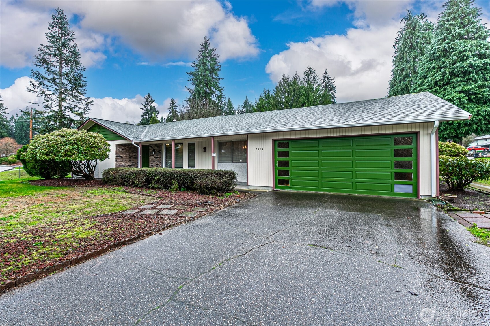 7505 Husky Way Southeast Lacey, WA 98503 - Photo 3 of 40 a view of a house with a yard and potted plants