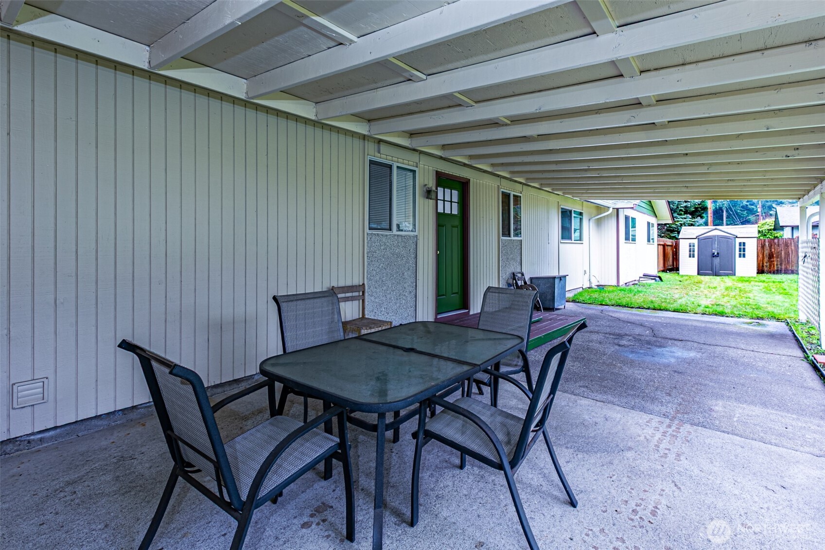 7505 Husky Way Southeast Lacey, WA 98503 - Photo 35 of 40 a patio with table and chairs
