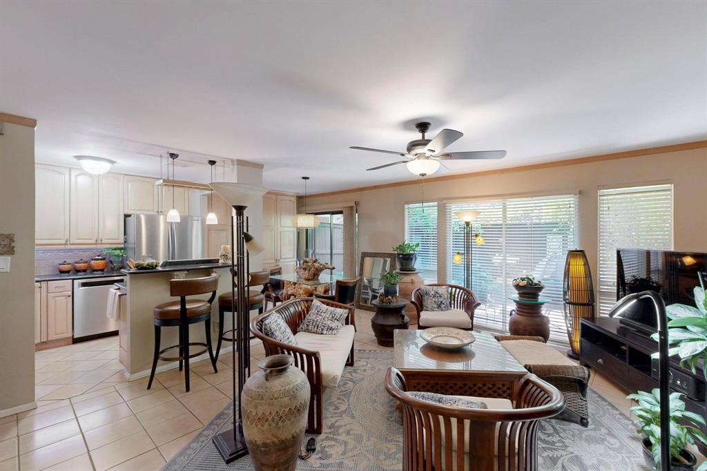 4112 Bowser Avenue, Unit 105 Dallas, TX 75219 - Photo 1 of 1 Open floor plan! Living, Dining and Kitchen with wall of windows to huge 24 x 8 ft private enclosed patio! Easy care tile floor and ceiling fan.