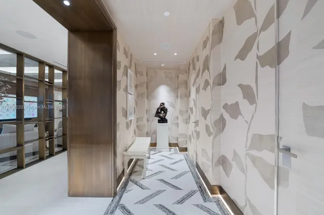 a bedroom with a bed and a view of bathroom