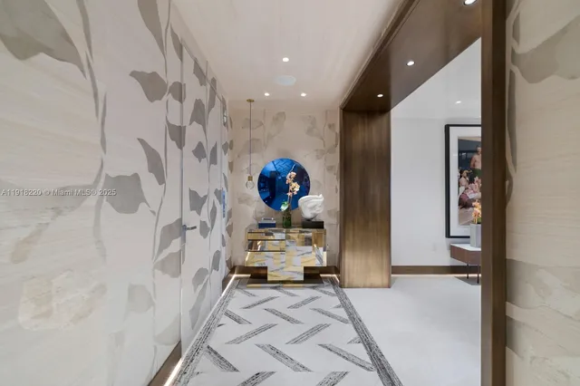 a bedroom with furniture and a flat screen tv