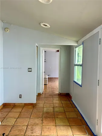 a view of a room with an empty room