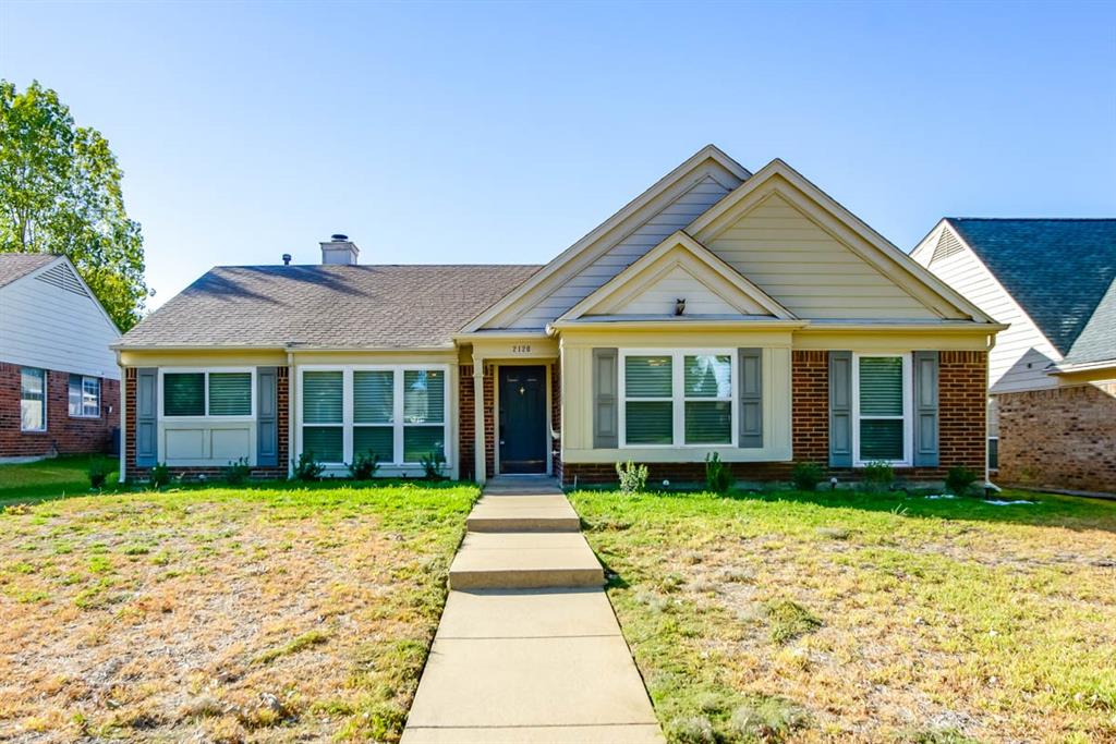 a view of a house with a garden