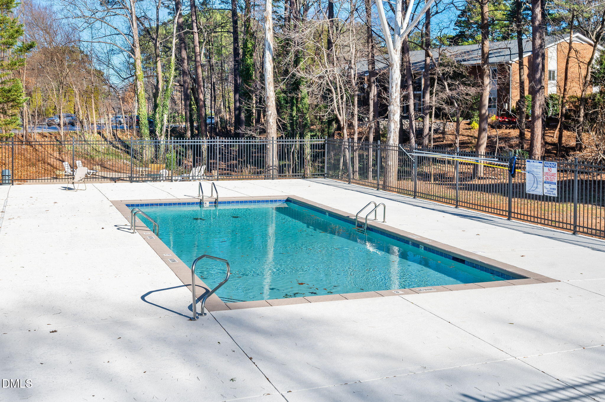 4603 Edwards Mill Road Raleigh, NC 27612 - Photo 23 of 26 a swimming pool with outdoor seating and yard