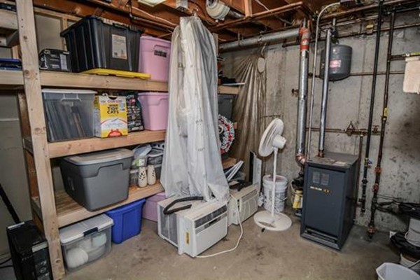 4 Belknap Road Hudson, NH 03051 - Photo 25 of 30 a view of a storage room with a lot of stuff