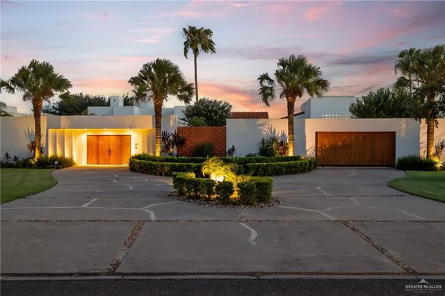 a view of backyard with swimming pool and outdoor seating