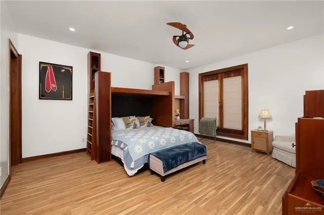 a bathroom with a sink vanity and a mirror