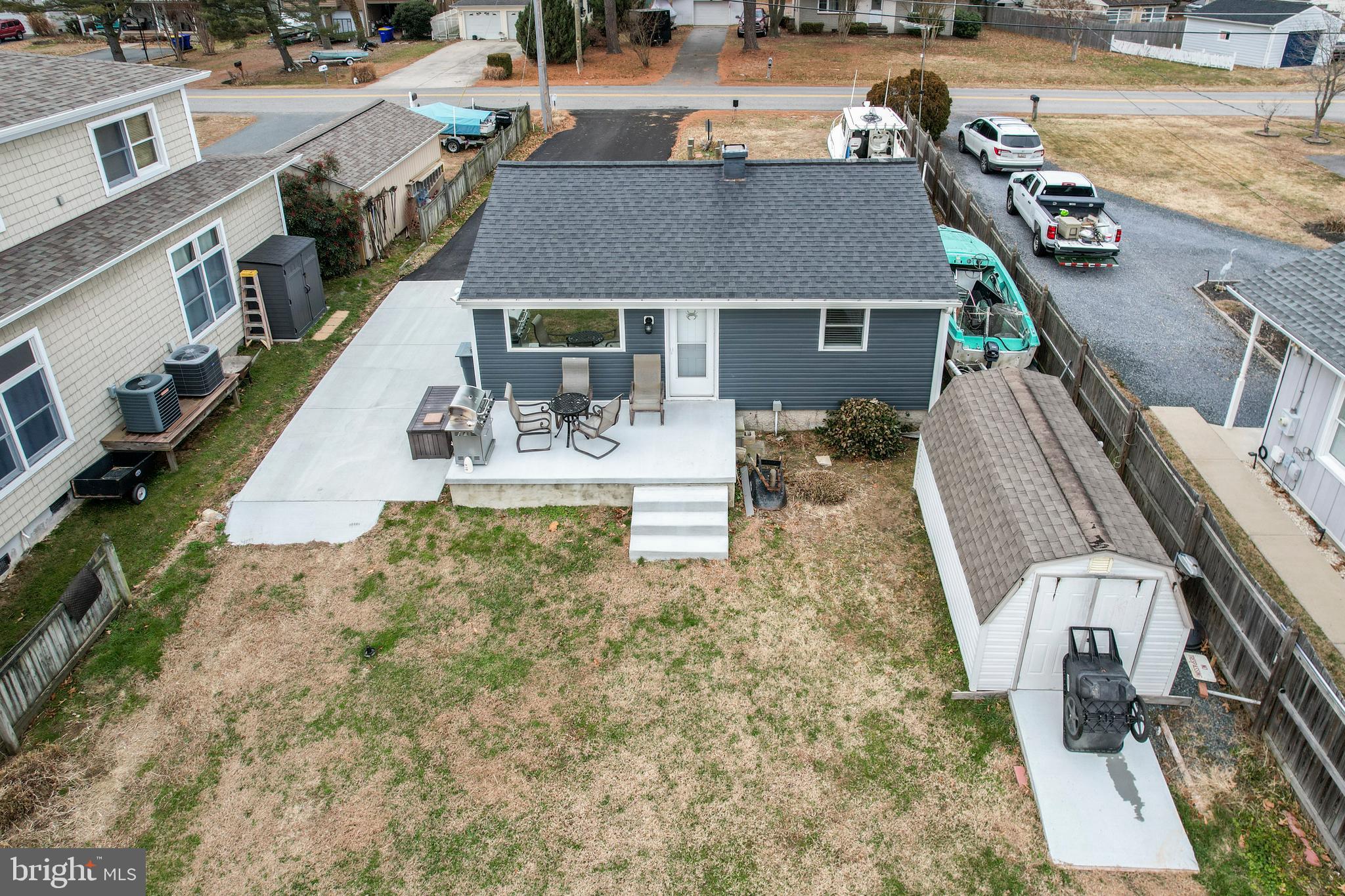 648 Chester River Beach Road Grasonville, MD 21638 - Photo 36 of 62 an aerial view of a house with outdoor space