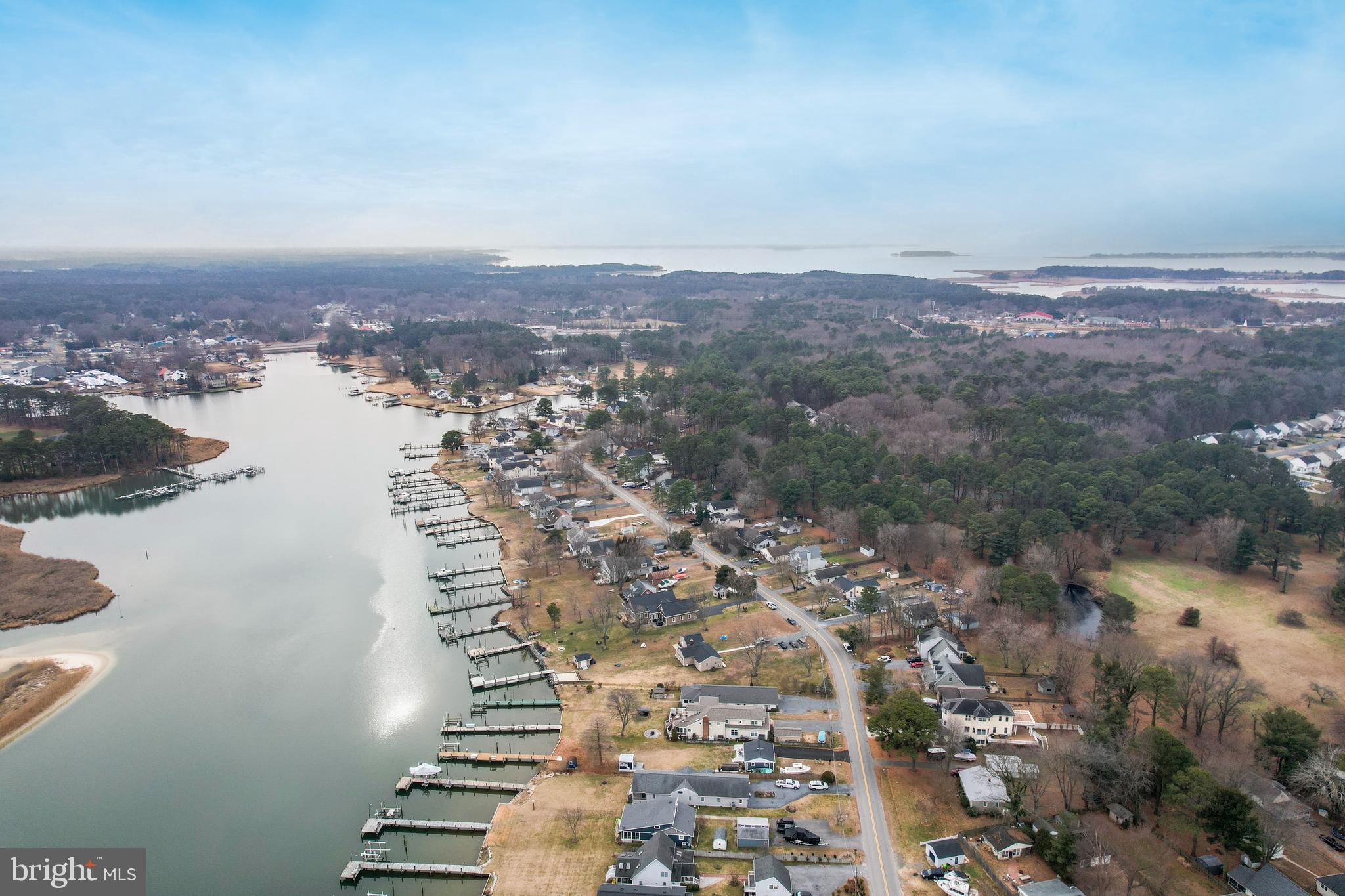 648 Chester River Beach Road Grasonville, MD 21638 - Photo 46 of 62 an aerial view of city and lake