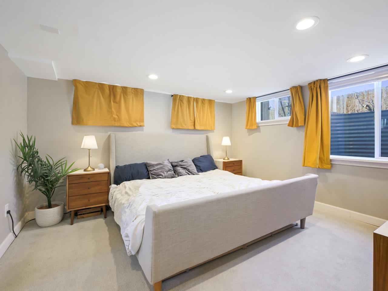 603-26 26 3/4 Road Grand Junction, CO 81506 - Photo 20 of 39 a bedroom with a bed and potted plant