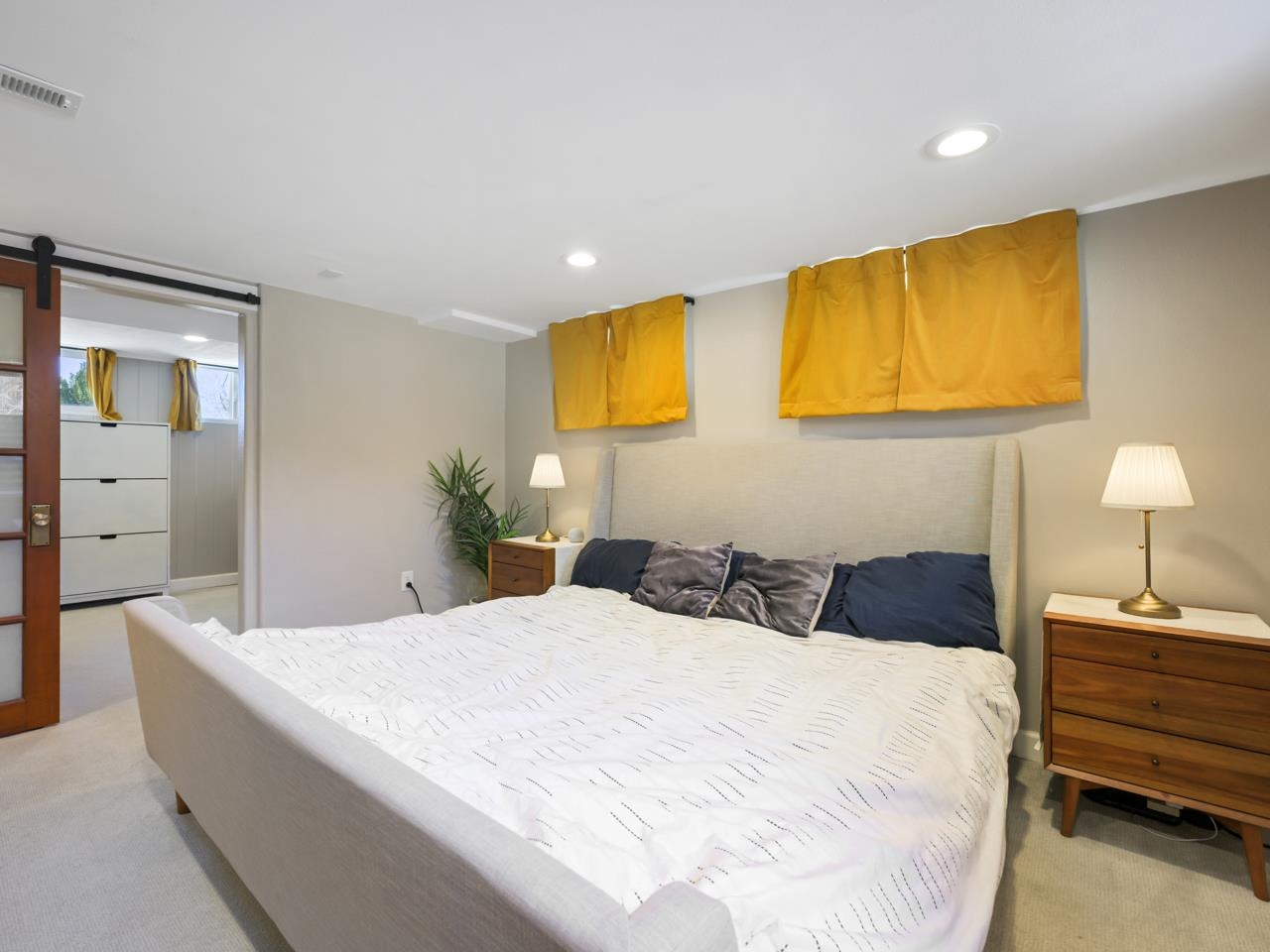 603-26 26 3/4 Road Grand Junction, CO 81506 - Photo 21 of 39 a bedroom with a bed and dresser