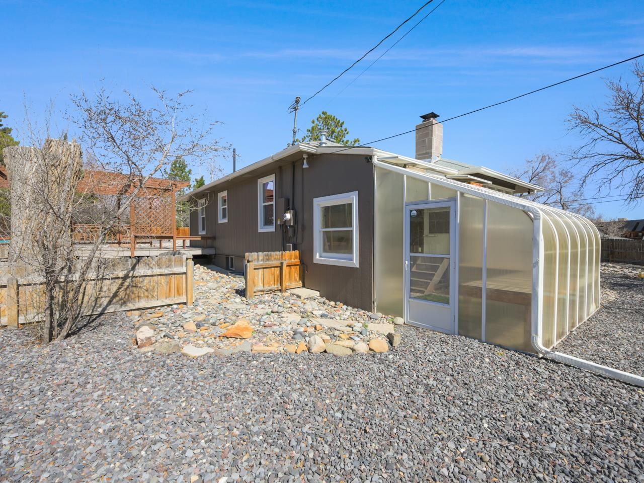 603-26 26 3/4 Road Grand Junction, CO 81506 - Photo 27 of 39 a front view of a house with a yard