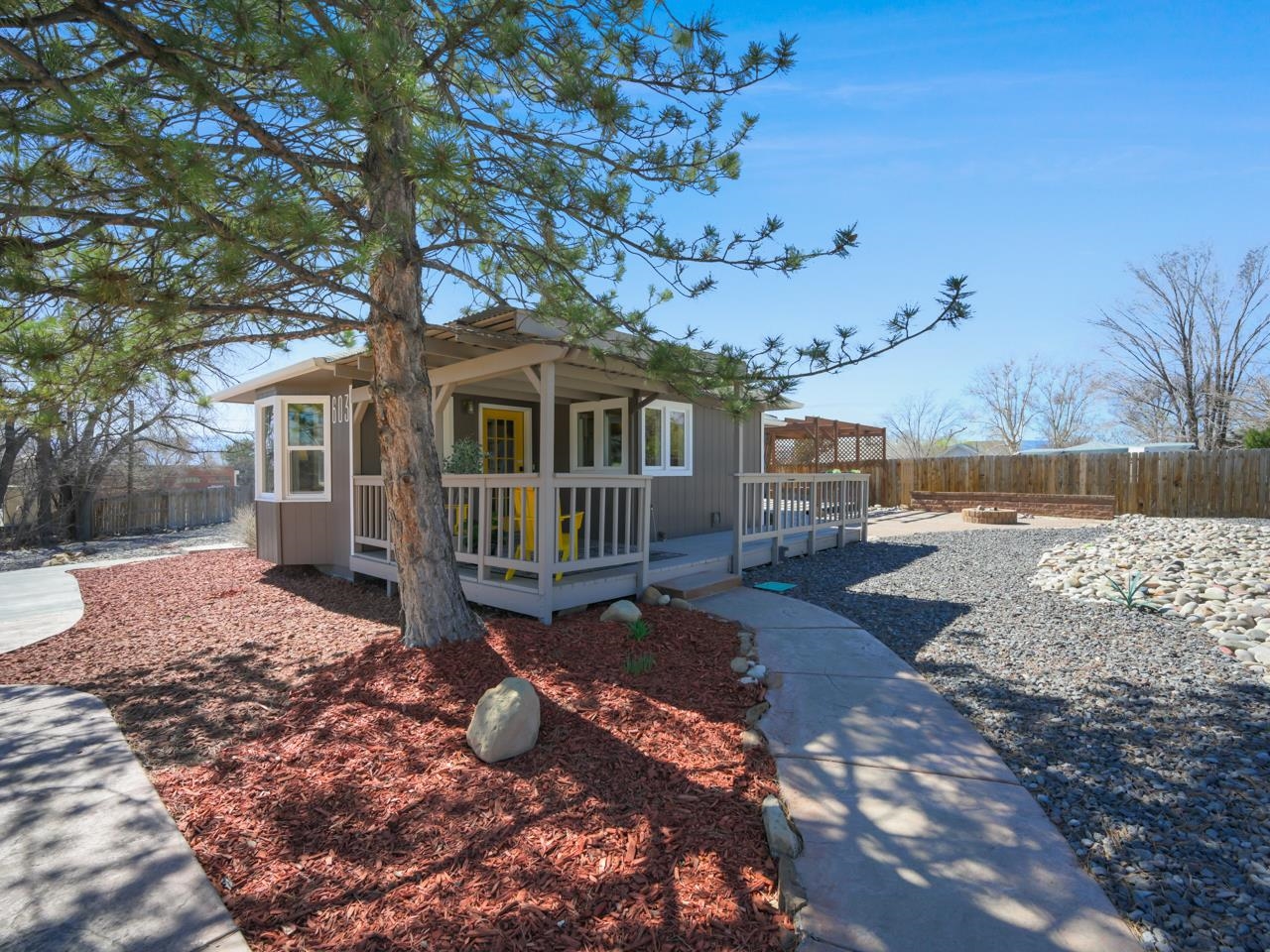 603-26 26 3/4 Road Grand Junction, CO 81506 - Photo 36 of 39 a view of a house with a yard