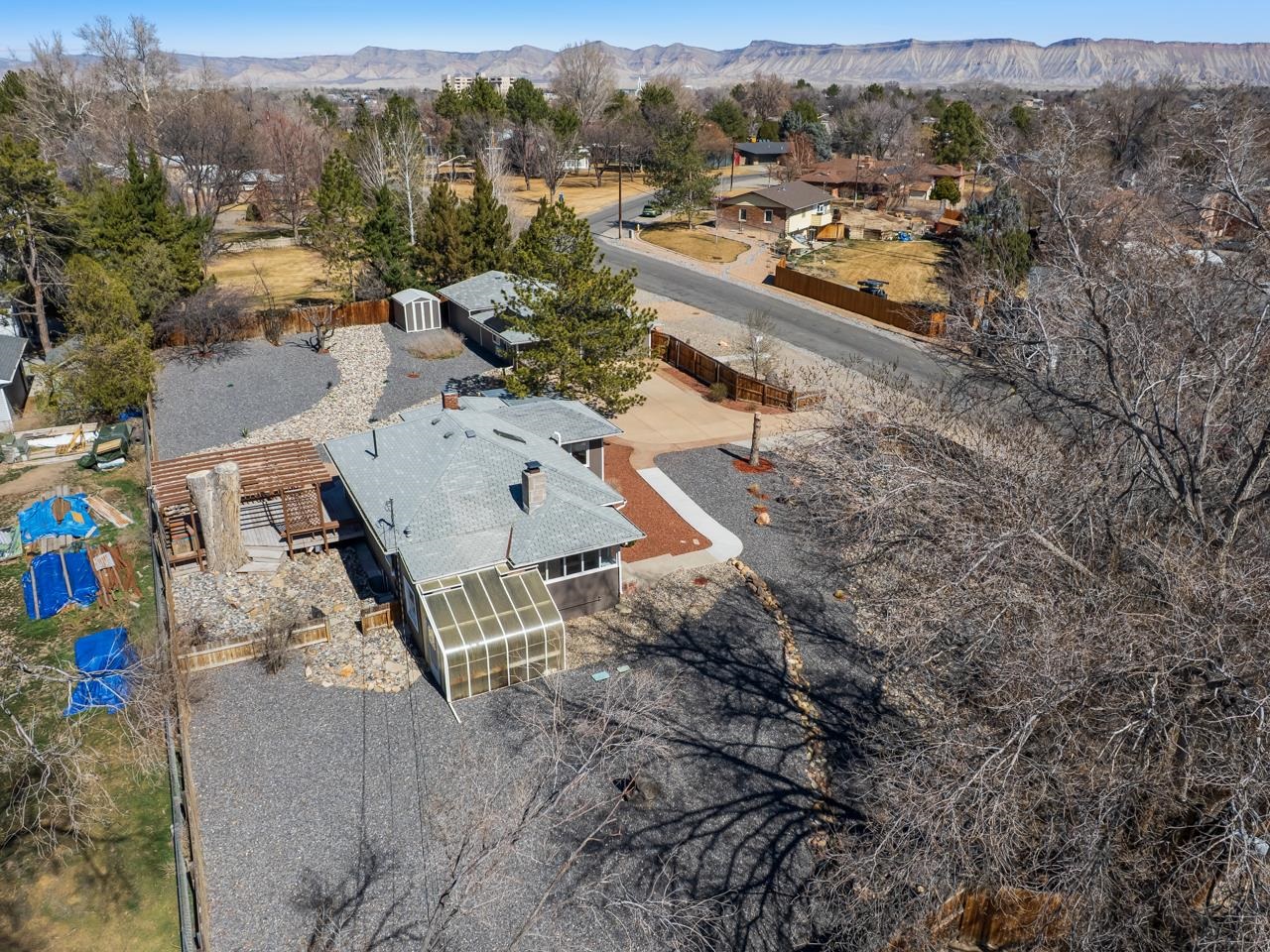 603-26 26 3/4 Road Grand Junction, CO 81506 - Photo 39 of 39 an aerial view of a house with a yard and mountain