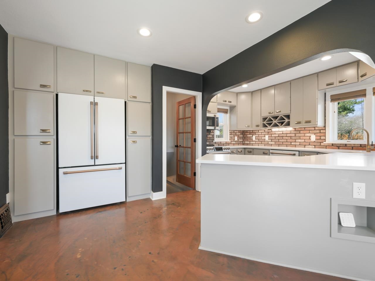 603-26 26 3/4 Road Grand Junction, CO 81506 - Photo 6 of 39 a kitchen with stainless steel appliances a refrigerator and a stove top oven