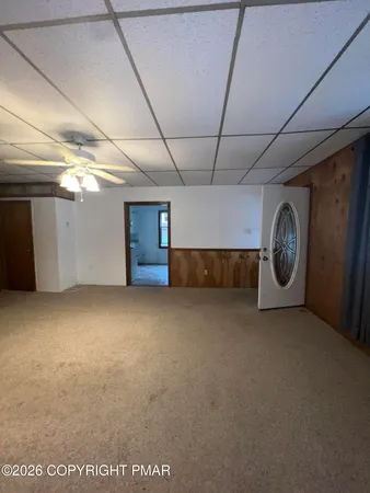 a kitchen with stainless steel appliances granite countertop a stove and a microwave