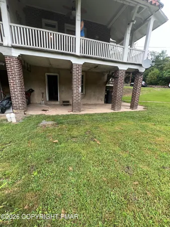a view of a house with a porch