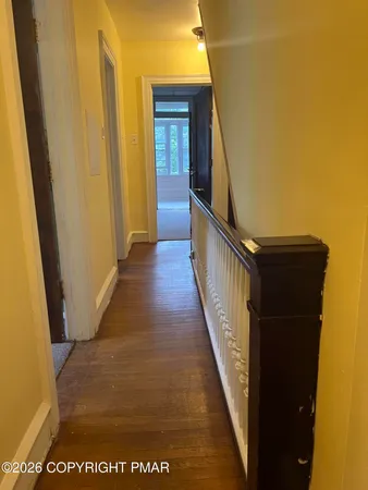 a bathroom with a sink toilet and mirror