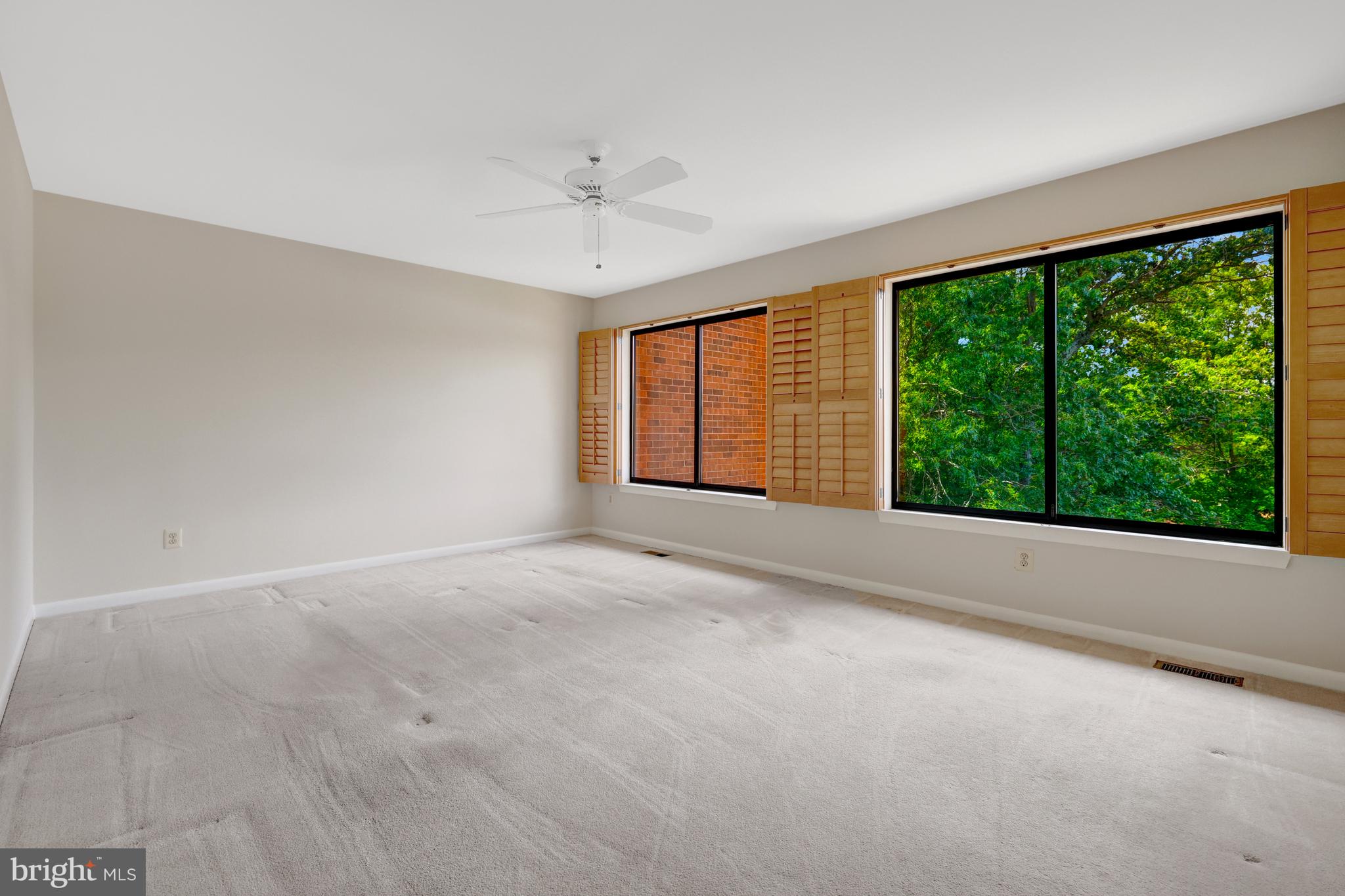 11088 Glade Court Reston, VA 20191 - Photo 24 of 75 a view of an empty room with a window