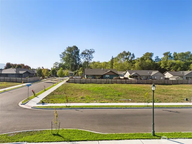 a view of an swimming pool with an outdoor seating