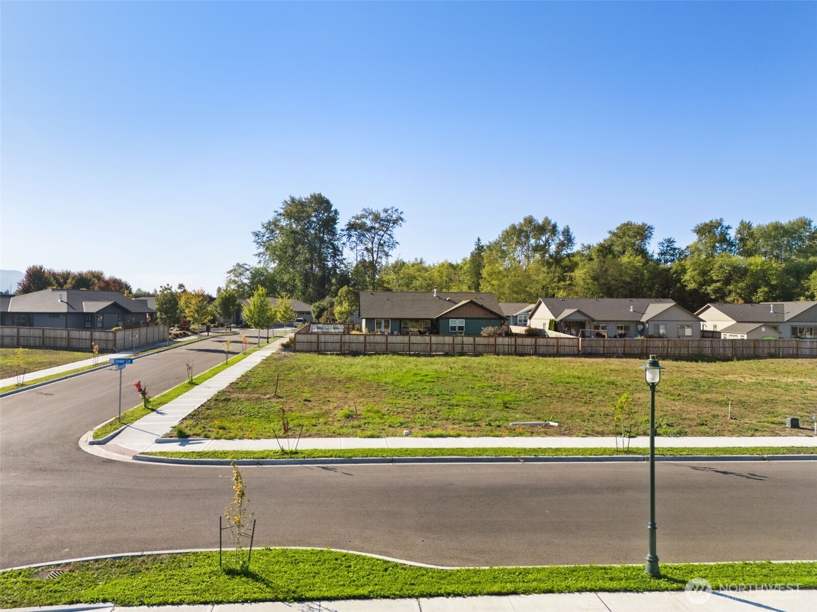 31 Colchester Street Sequim, WA 98382 - Photo 2 of 22 a view of an swimming pool with an outdoor seating