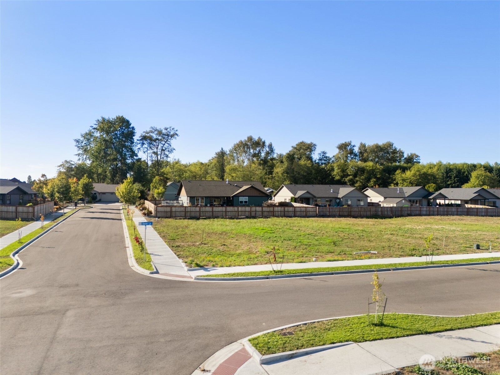31 Colchester Street Sequim, WA 98382 - Photo 4 of 22 a view of a swimming pool with an outdoor seating and yard