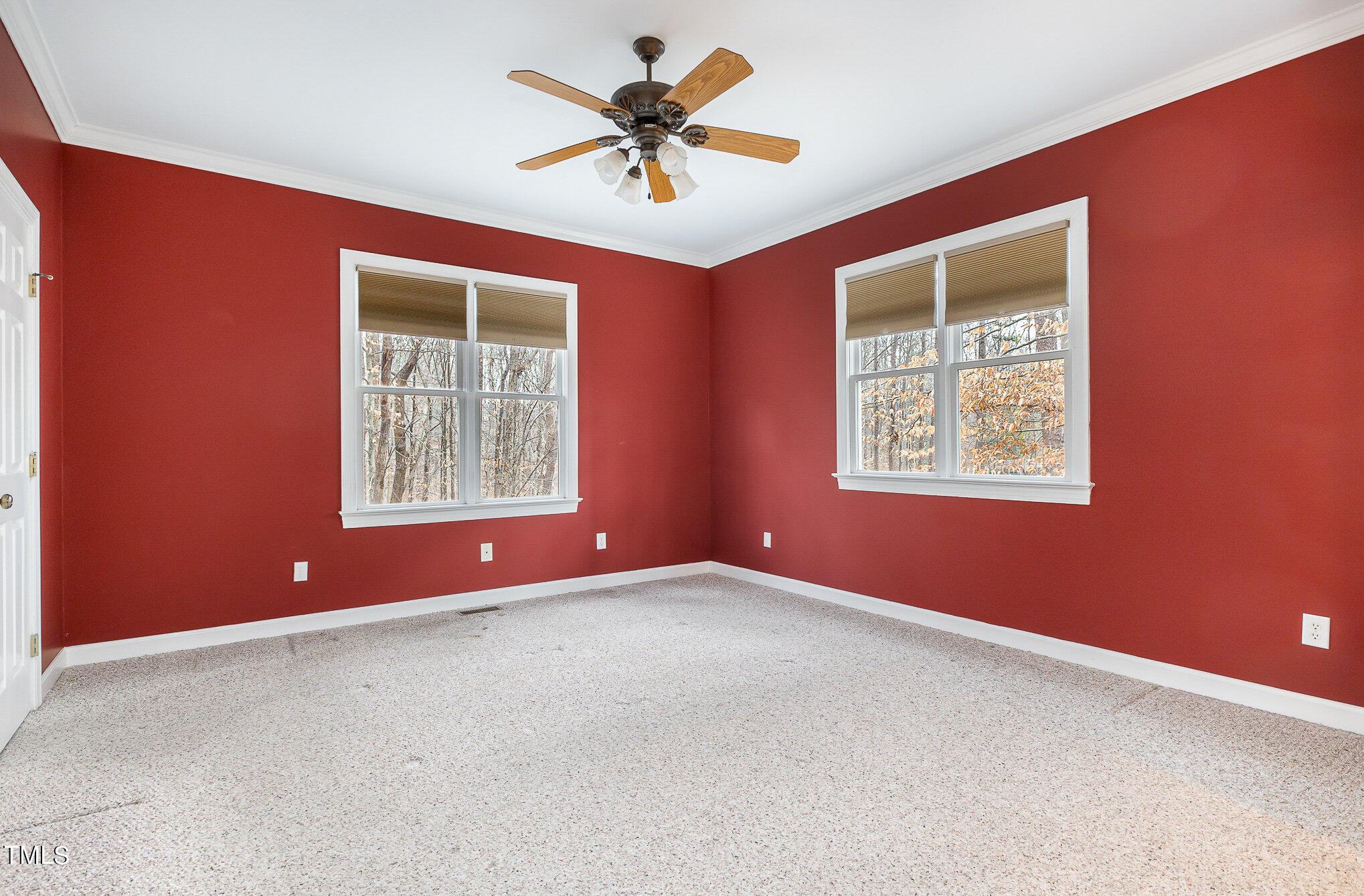 2308 Mt Vernon Church Road Raleigh, NC 27614 - Photo 19 of 59 an empty room with windows and fan