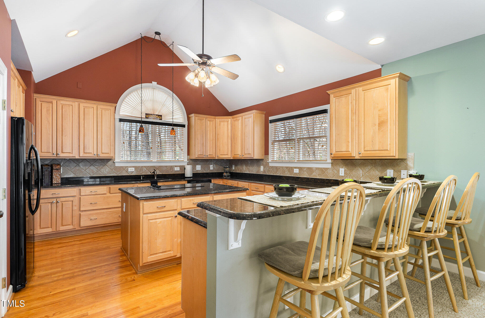 2308 Mt Vernon Church Road Raleigh, NC 27614 - Photo 3 of 59 a kitchen with a sink a counter and a view of living room